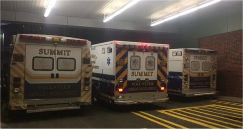 3 Summit ambulances at the Overlook Medical Center emergency entrance.